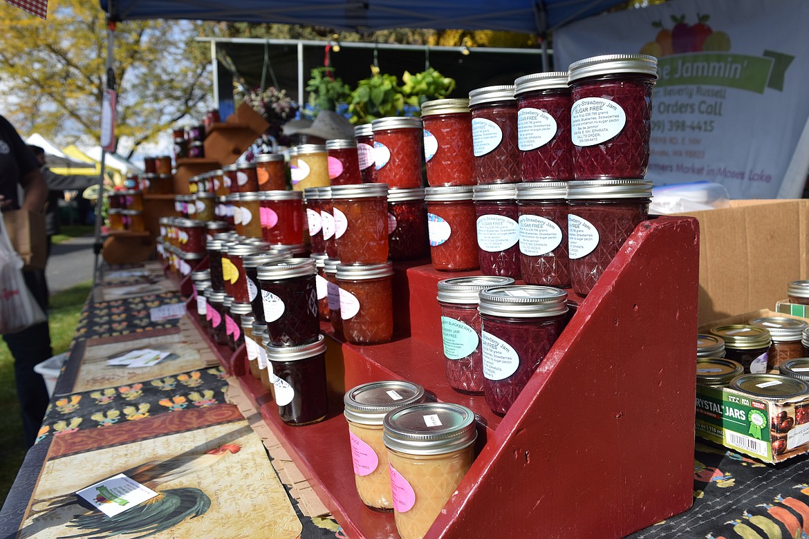 Jams, preserves, marmalades and jellies line the shelves at Bev Be Jammin’s stand at the Moses Lake Farmers Market.