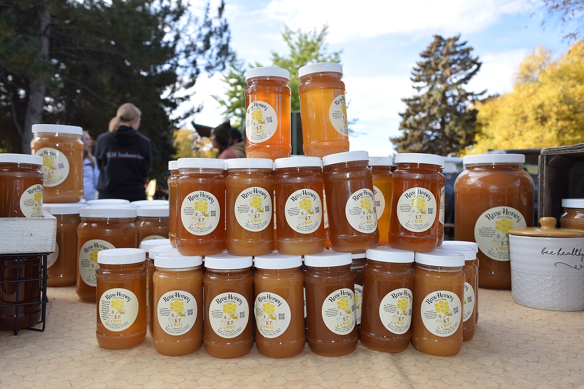 A pyramid of honey waits for customers at the E.T. Bees stand at the Moses Lake Farmers Market.