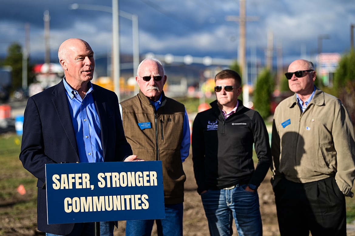 Gov. Greg Gianforte speaks during a press conference highlighting infrastructure investments with Sen. John Fuller, Rep. Braxton Mitchell and Sen. Mark Noland at the Reserve Drive road construction project on Tuesday, Oct. 22. (Casey Kreider/Daily Inter Lake)