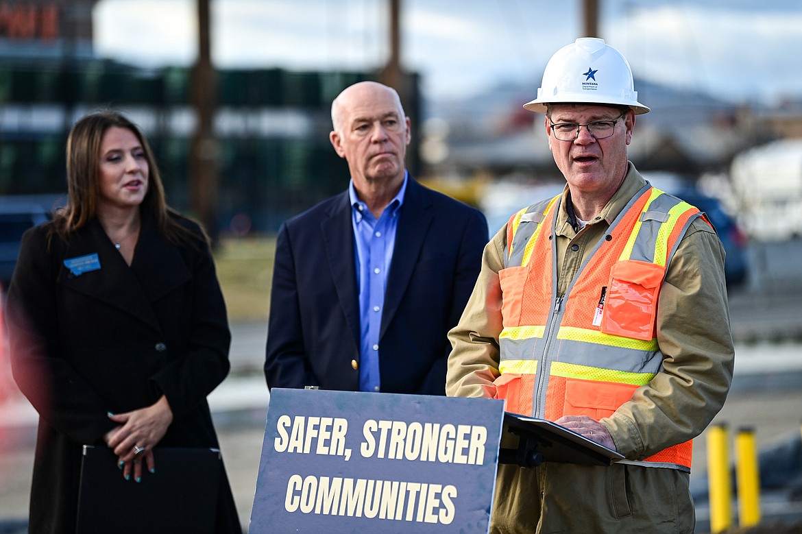 Montana Department of Transportation Deputy Director Larry Flynn speaks during a press conference highlighting infrastructure investments with Gov. Greg Gianforte and Rep. Courtenay Sprunger at the Reserve Drive road construction project on Tuesday, Oct. 22. (Casey Kreider/Daily Inter Lake)