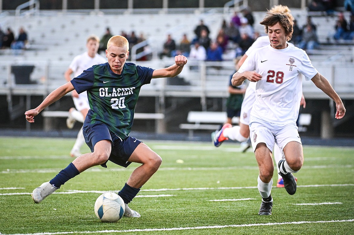 Glacier's Alex Hoerner (20) sends a shot towards the goal in the second half against Helena in the first round of the Class AA playoffs at Legends Stadium on Tuesday, Oct. 22. (Casey Kreider/Daily Inter Lake)