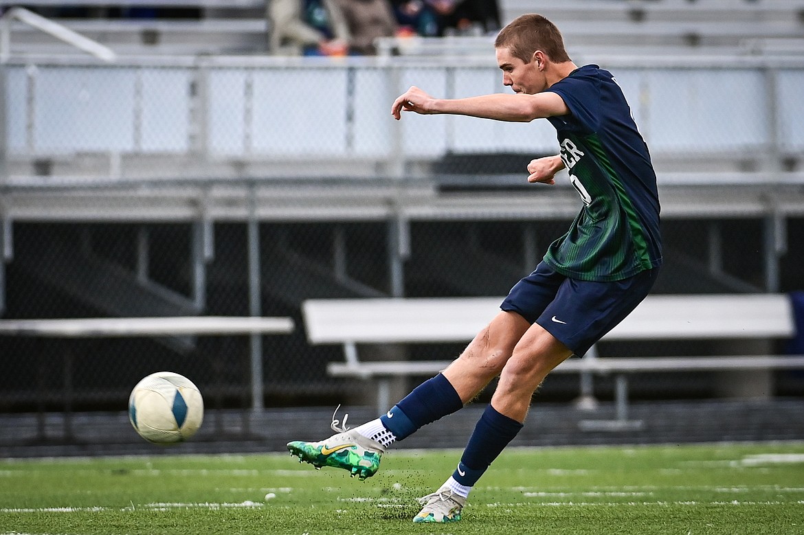 Glacier's Brayden Jenkinson (10) sends a shot towards the goal in the first half against Helena in the first round of the Class AA playoffs at Legends Stadium on Tuesday, Oct. 22. (Casey Kreider/Daily Inter Lake)