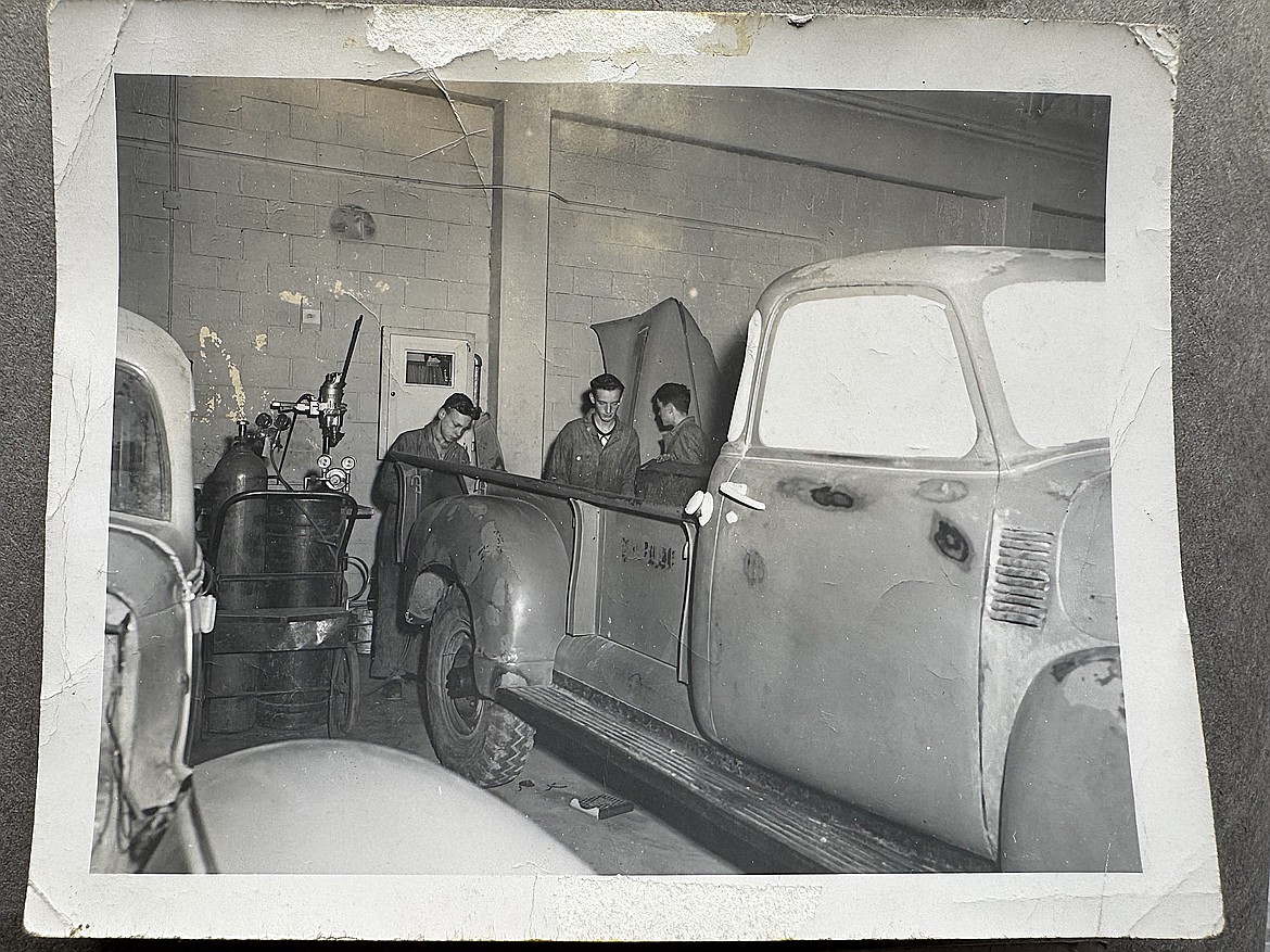 An old photo of auto students working on a truck at Flathead High School (formerly Flathead County High School) on Nov. 18, 1953. The automotive program marks its 75th anniversary this year. (Hilary Matheson/Daily Inter Lake)