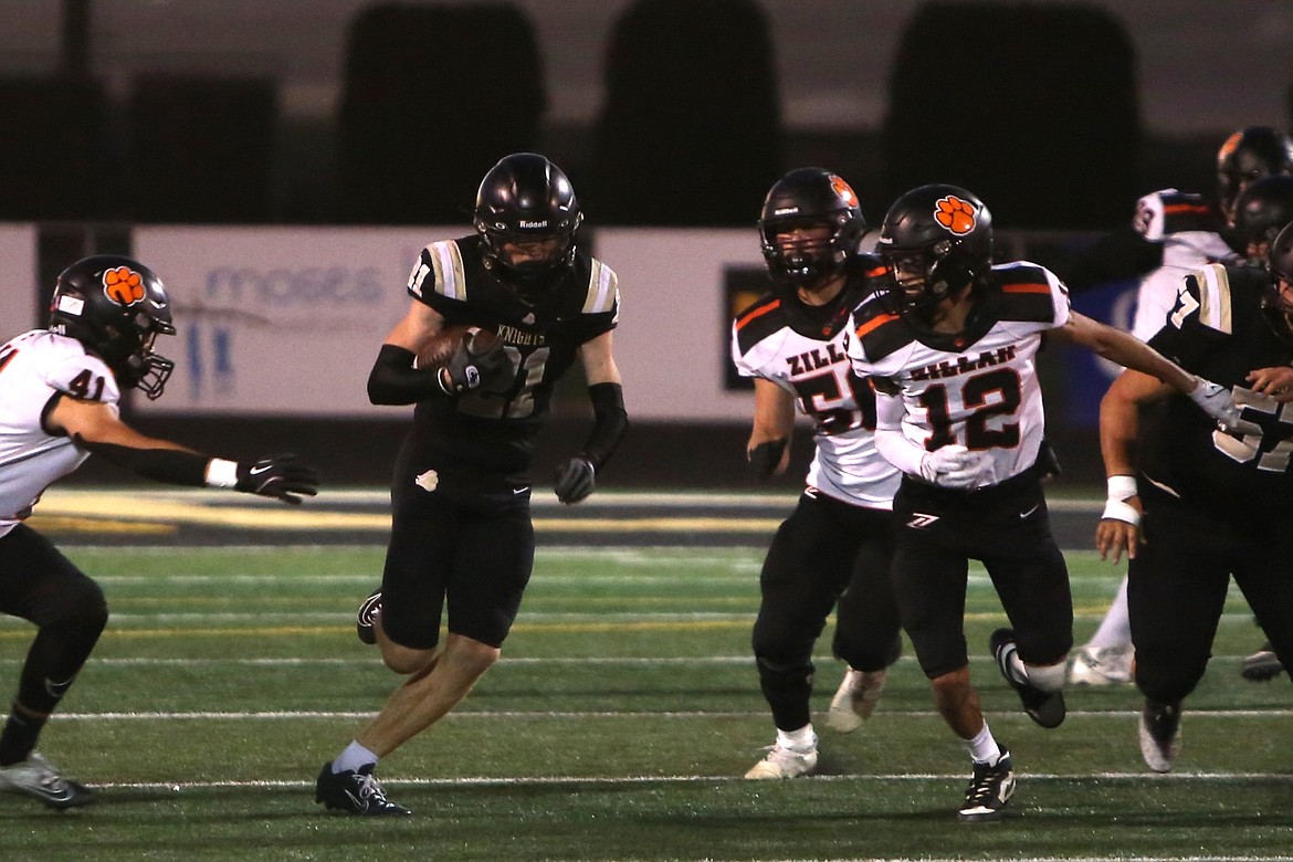 Royal senior Jackson Larsen (21) carries the ball during a Sept. 27 game against Zillah. Larsen accounted for four total touchdowns Friday against Wahluke.