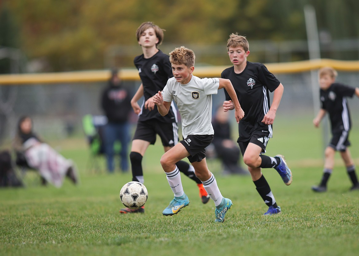 Photo by BUSCEMA PHOTOGRAPHY
The Sting SC 11B Premier boys soccer team played two games on Saturday, Oct. 19. In their first match, the Sting defeated the Storm FC B2011 Guel 5-1, thanks to goals by Dylan Baune, Lucas Buscema and Hudson Ryan, and two by Cooper Oswald. Kolby Johnson and Lucas Buscema played goalkeeper for the team.  The Sting then fell 2-0 to 90+ Project - B2011 Cushman in the second game. The Sting plays Legacy SA B2011/12 Hamer 2 at home on Saturday. Pictured is Cooper Oswald of the Sting, scoring one of his two goals.