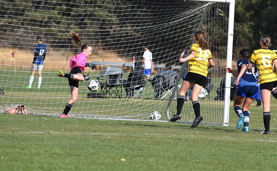 Photo by KARI HYNES
This past weekend, the Sting Soccer Club 11G Academy/DPL team competed against WE SURF SC G10 ROYAL and the Spokane Sounders Shadow G2011 DPL teams. On Saturday, the Sting beat the WE SURF SC G10 ROYAL TRAPPED 5-0 win. Goals were scored by Presley Moreau (with an assist from Brightyn Gatten), Brightyn Gatten, Presley Moreau (another assist from Brightyn Gatten), Kylie Lorona and a penalty kick by Olivia Nusser. On Sunday the Sting beat the Spokane Sounders Shadow G2011 DPL 5-1. Hailey Hayes netted three goals, one an assist from Lucy Doyle, and Doyle scored twice. Pictured at left is Sting goalkeeper Kenzie Dolan. Last weekend marked the conclusion of the Sting's Fall DPL season, where they currently rank in first place in the Northwest U14 bracket. Throughout the fall, they allowed only 3 goals while scoring 36. The team will begin its spring DPL season in January. This weekend, the Sting will close out their Fall WISL season with matches against Legacy SA-G2010 Vela/Fiske and WE SURF SC G10/11 Black.