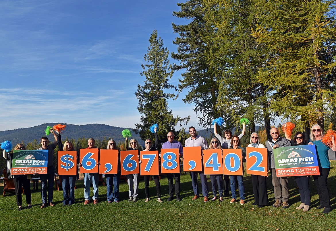 Whitefish Community Foundation board members and staff line up for a photo celebrating the 2024 Great Fish Community Challenge net total of nearly $6.7 million. (Kelsey Evans/Whitefish Pilot)