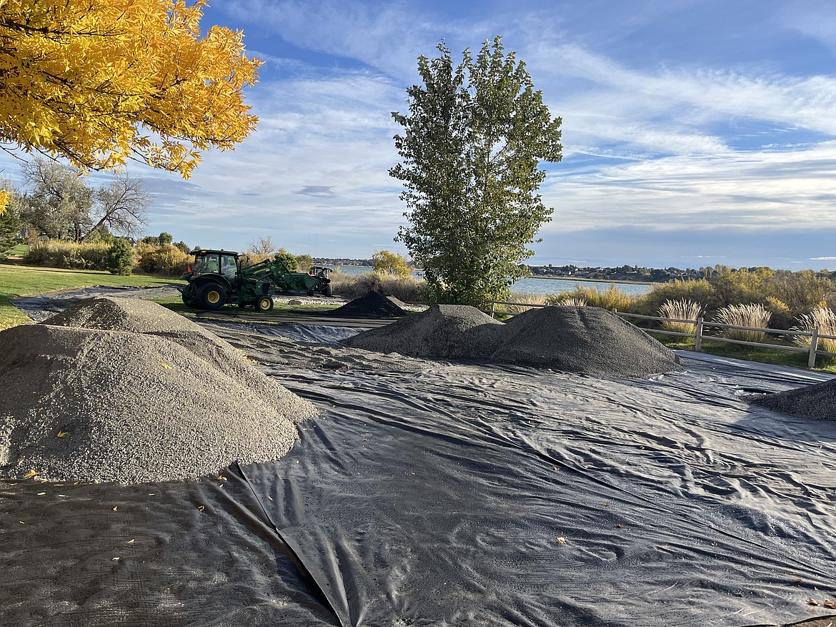 Fabric covers the ground at Lower Peninsula Park where the native plant garden is about to be installed. The garden used 10 truckloads of gravel and two truckloads of sand to replace the irrigated grass, said city Park Foreman Berto Chavez.