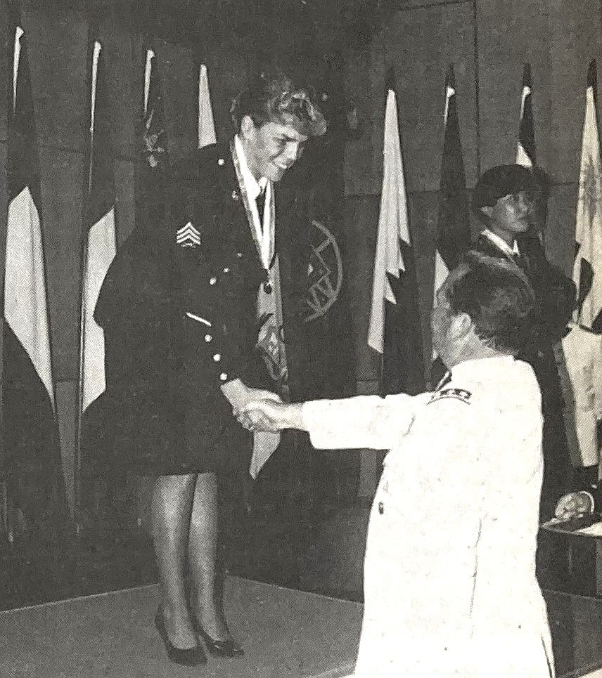 In the 1980s, Roxane Conrad receives a gold medal after winning the individual women’s pistol rapid-fire championship in Santiago, Chile.