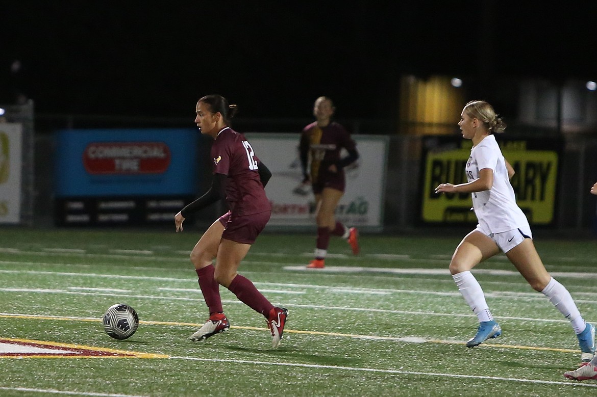 Moses Lake senior Meadow Saenz (12) brings the ball out of the defending third during the first half against Wenatchee on Tuesday. Saenz scored the first goal of the game, connecting on a deep shot in the 22nd minute.