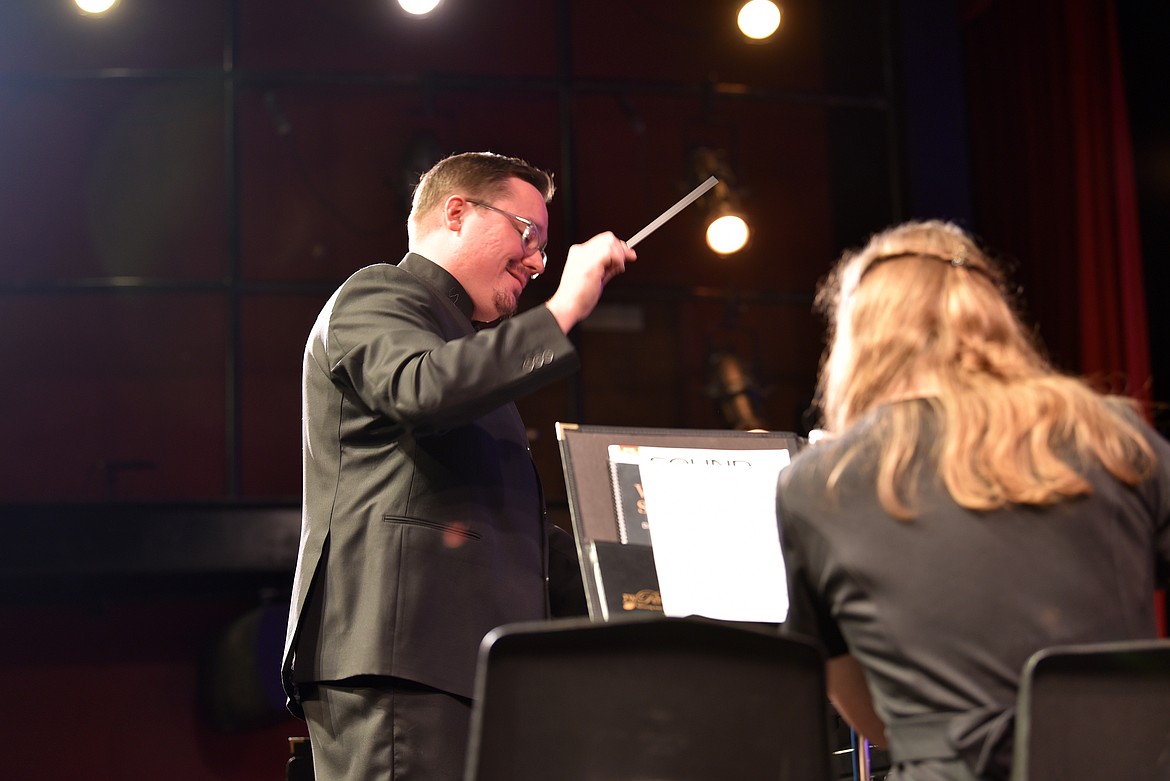 Instructor Matthew King conducting at the Whitefish High School fall band concert on Oct. 22. (Kelsey Evans/Whitefish Pilot)