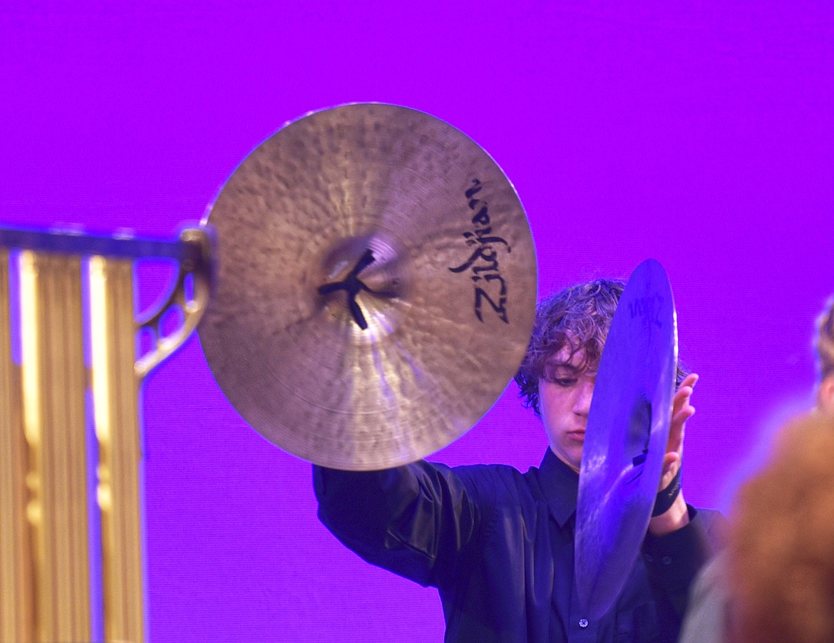 Junior Kaleb Rosenstein plays the cymbal at the fall band concert on Oct. 22. (Kelsey Evans/Whitefish Pilot)