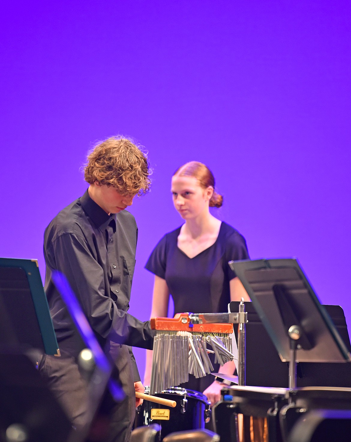 Junior Kaleb Rosenstein, front, and freshman Vivian Trieweiler, back, at the fall band concert on Oct. 22. (Kelsey Evans/Whitefish Pilot)