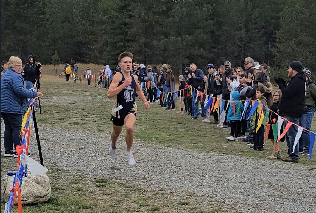 Courtesy photo
Timberlake sophomore Caleb Royce runs toward the finish line to win the 4A District 1 boys cross country race at Farragut State Park on Thursday.