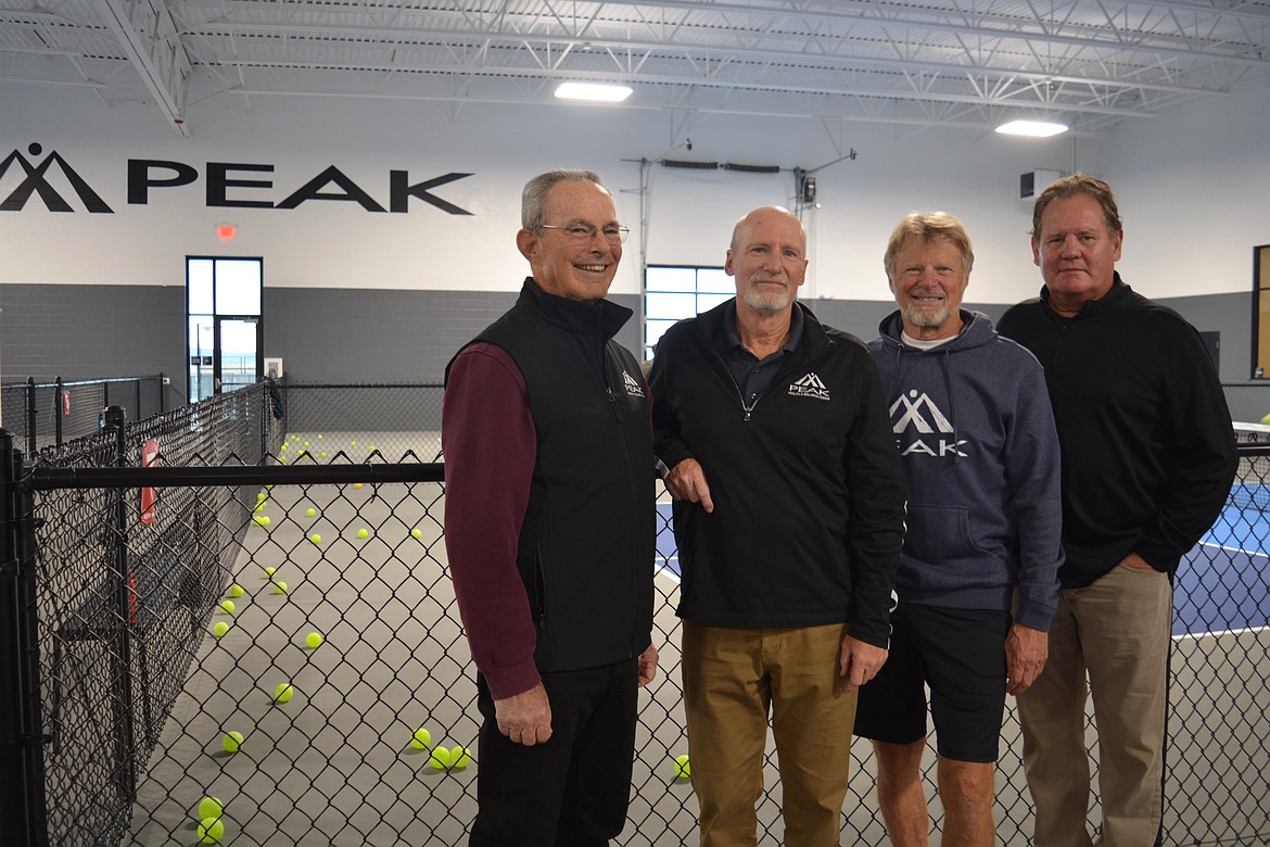 PEAK Health and Wellness Center owners Jim Doty, Gary Retter, Chip Althen and Jack Tawney stand by the new pickleball courts Thursday at the expansive new facility in Post Falls. The Fennecus Road location replaced the Polston Avenue location in late August.