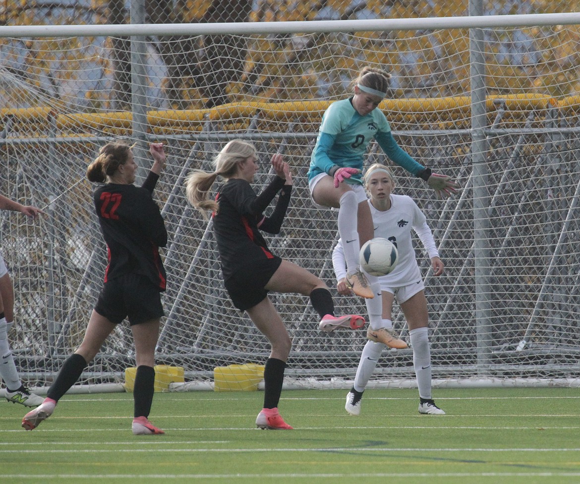 MARK NELKE/Press
Lake City sophomore goalkeeper Savvy Spencer soars to snuff out a scoring attempt by Owyhee in the first half in the first round of the state 6A girls soccer tournament Thursday morning at War Memorial Field in Sandpoint.