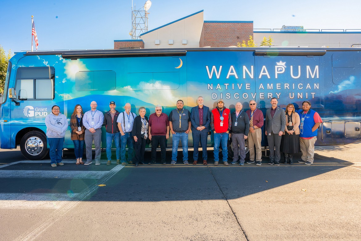 Grant County PUD commissioners and staff received a tour of the new Wanapum Native American Discovery Unit Tuesday. From left, Grant PUD Traditional Programs Supervisor Lela Buck, PUD Chief Enterprise Shared Services Officer Fallon Long, Chief Human Resource Officer Tod Ayers, Chief Operating Officer Jeff Grizzel, PUD commissioners Nelson Cox, Judy Wilson and Tom Flint, Wanapum Liaison Clayton Buck, PUD General Manager/CEO Rich Wallen, Wanapum Tribe member George Mathias, PUD commissioners Terry Pyle and Larry Schaapman, PUD Chief Customer Officer Ty Ehrman, PUD Chief Financial Officer Bonnie Overfield and Cultural Project employee Kenny Mathias.