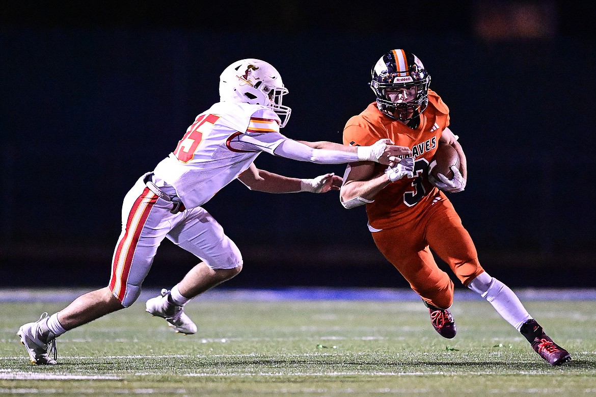 Flathead wide receiver Lane Chivers (3) picks up yardage on a reception in the fourth quarter against Missoula Hellgate at Legends Stadium on Friday, Oct. 25. (Casey Kreider/Daily Inter Lake)