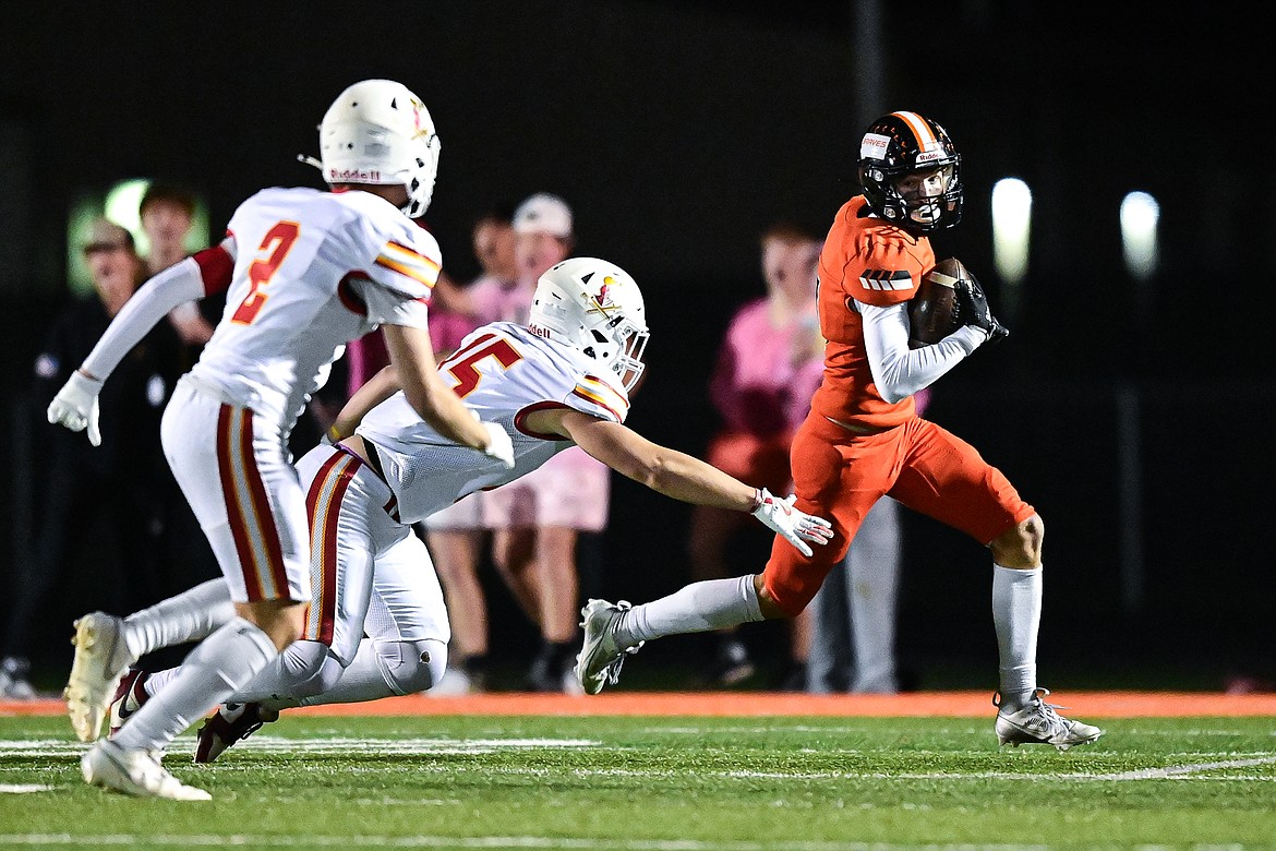 Flathead kick returner Will Hollensteiner (7) returns a kickoff in the third quarter against Missoula Hellgate at Legends Stadium on Friday, Oct. 25. (Casey Kreider/Daily Inter Lake)