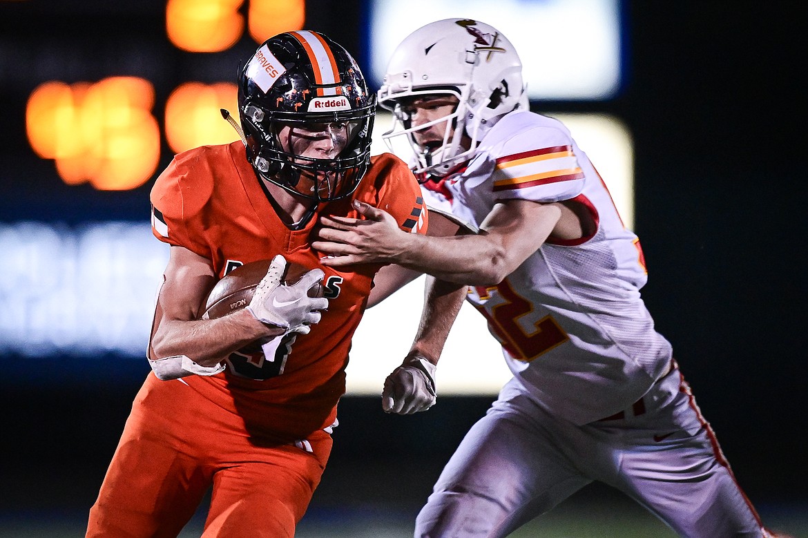 Flathead wide receiver Lane Chivers (3) picks up yardage on a reception in the fourth quarter against Missoula Hellgate at Legends Stadium on Friday, Oct. 25. (Casey Kreider/Daily Inter Lake)