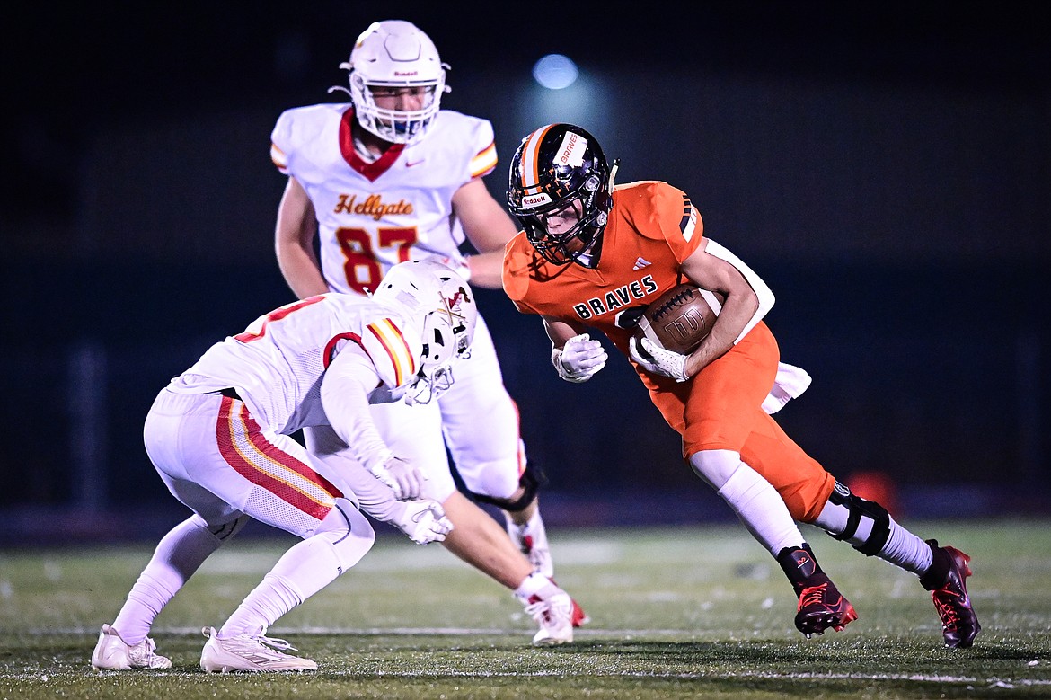 Flathead wide receiver Lane Chivers (3) picks up yardage on a reception in the second quarter against Missoula Hellgate at Legends Stadium on Friday, Oct. 25. (Casey Kreider/Daily Inter Lake)