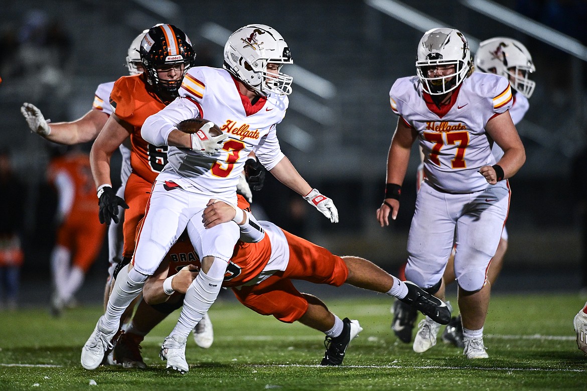 Hellgate wide receiver Parker Link (3) looks for running room in the first quarter against Flathead at Legends Stadium on Friday, Oct. 25. (Casey Kreider/Daily Inter Lake)