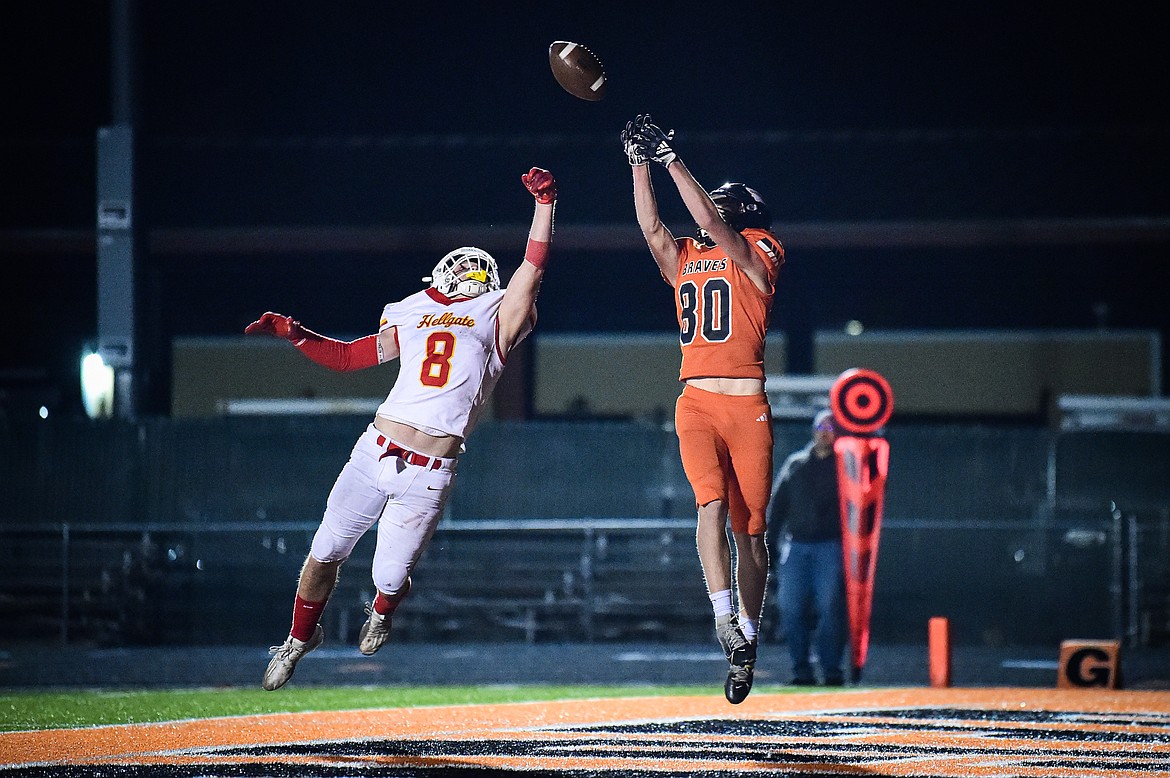 Flathead wide receiver Jack Blodgett (80) catches a touchdown reception in the fourth quarter against Missoula Hellgate at Legends Stadium on Friday, Oct. 25. (Casey Kreider/Daily Inter Lake)