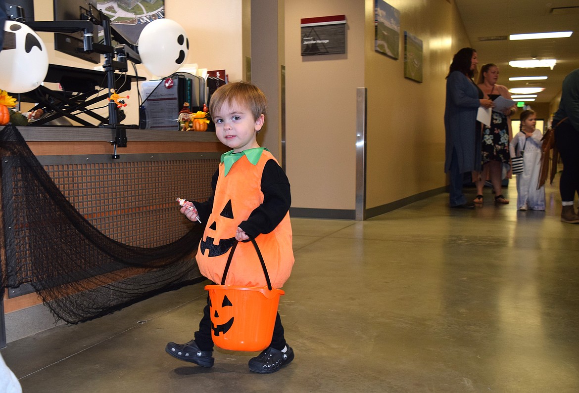 Leo, 2, came with his mom to Friday's Trick or Treat Open House at NIC’s Parker Technical Education campus dressed as a pumpkin.