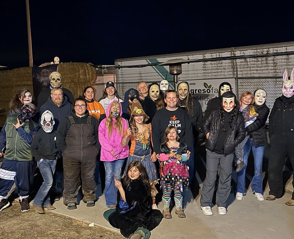 A scary crew of scarers pauses for a photo before going about their work at the Othello straw maze.