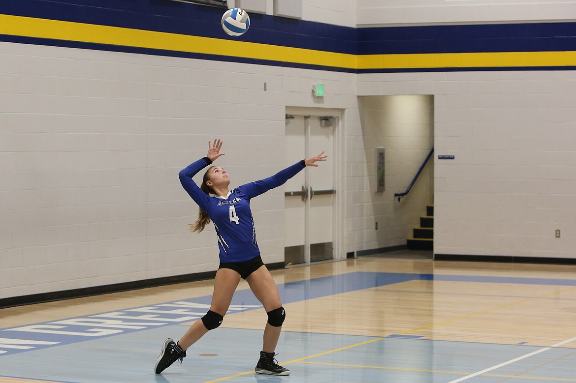 Soap Lake junior Sage Hart serves the ball during the third set against Wilson Creek on Thursday.