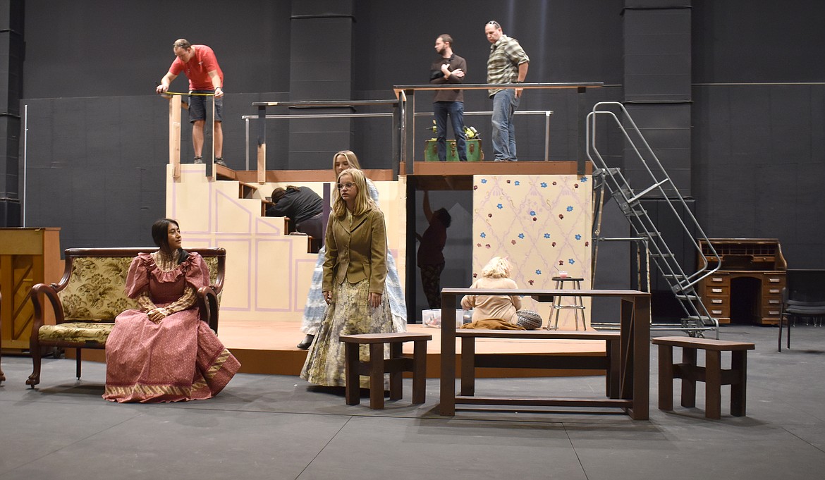 The Quincy High School production of “Little Women” includes a detailed set, including a kitchen with hand-painted wallpaper.