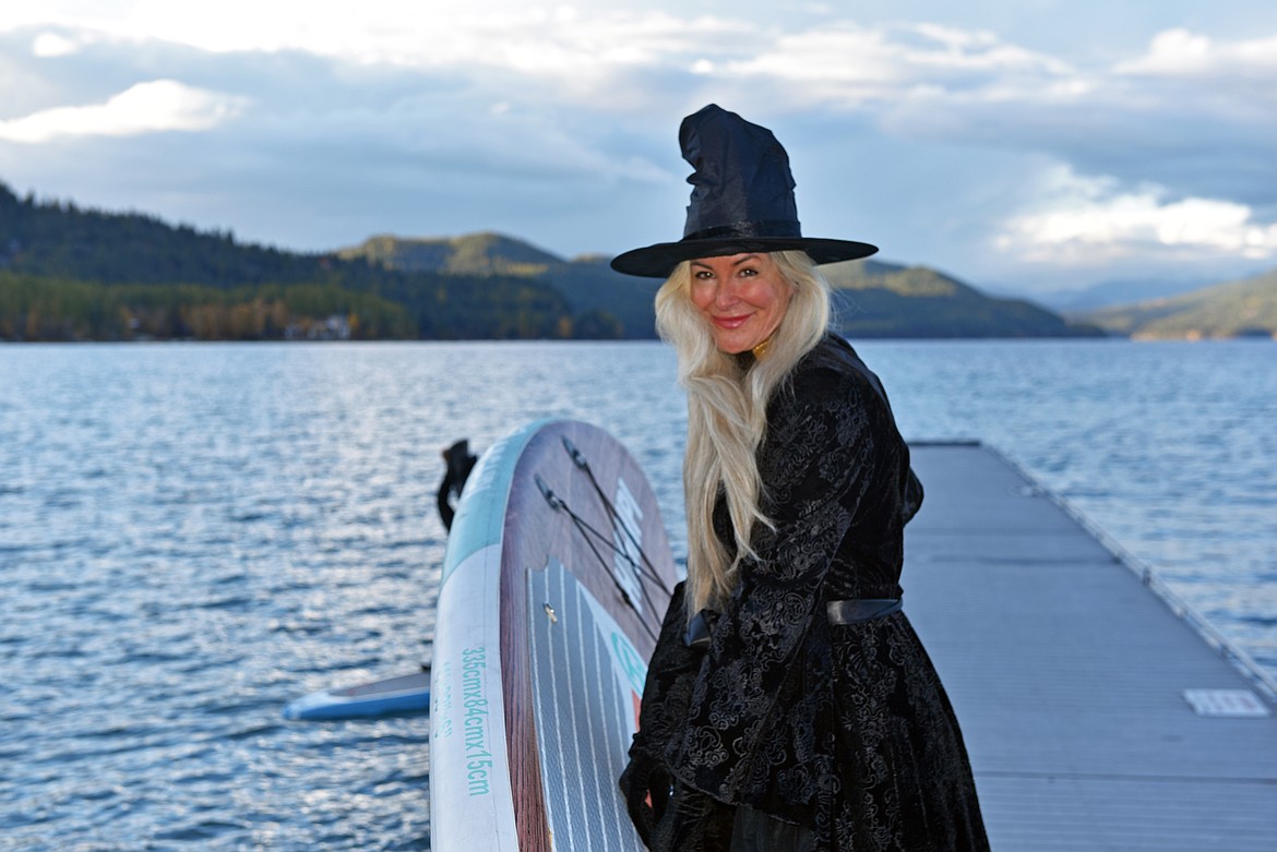 Dozens of residents and their fluffy friends dressed as witches for a fun, spooky venture sweeping and paddling down Whitefish Lake and River on Oct. 17. (Kelsey Evans/Whitefish Pilot)