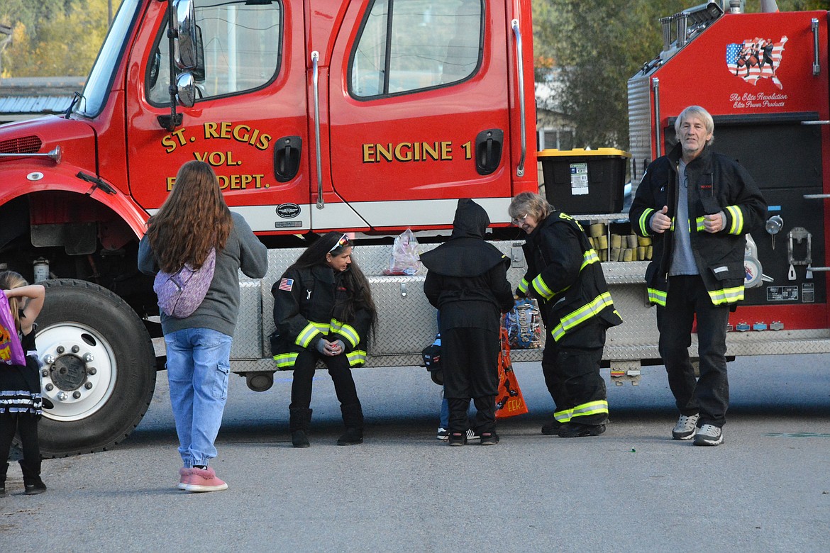 What kid doesn't love a tour of a big red fire truck? The St. Regis Volunteer Fire Department came out to the festival to hand out candy and give tours of the truck. (Mineral Independent/Amy Quinlivan)