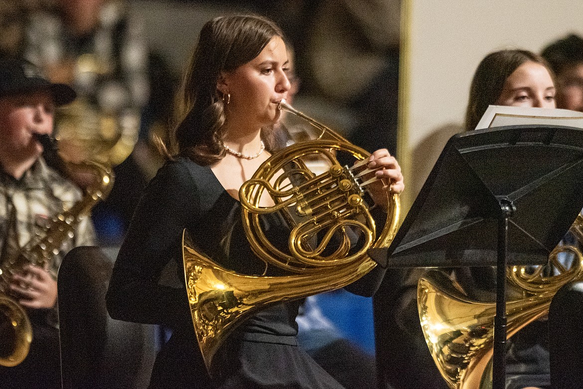 Seventh grader Audrey Lowell plays French horn in the Fall concert at Bigfork High School Monday, Oct. 28. (Avery Howe/Bigfork Eagle)