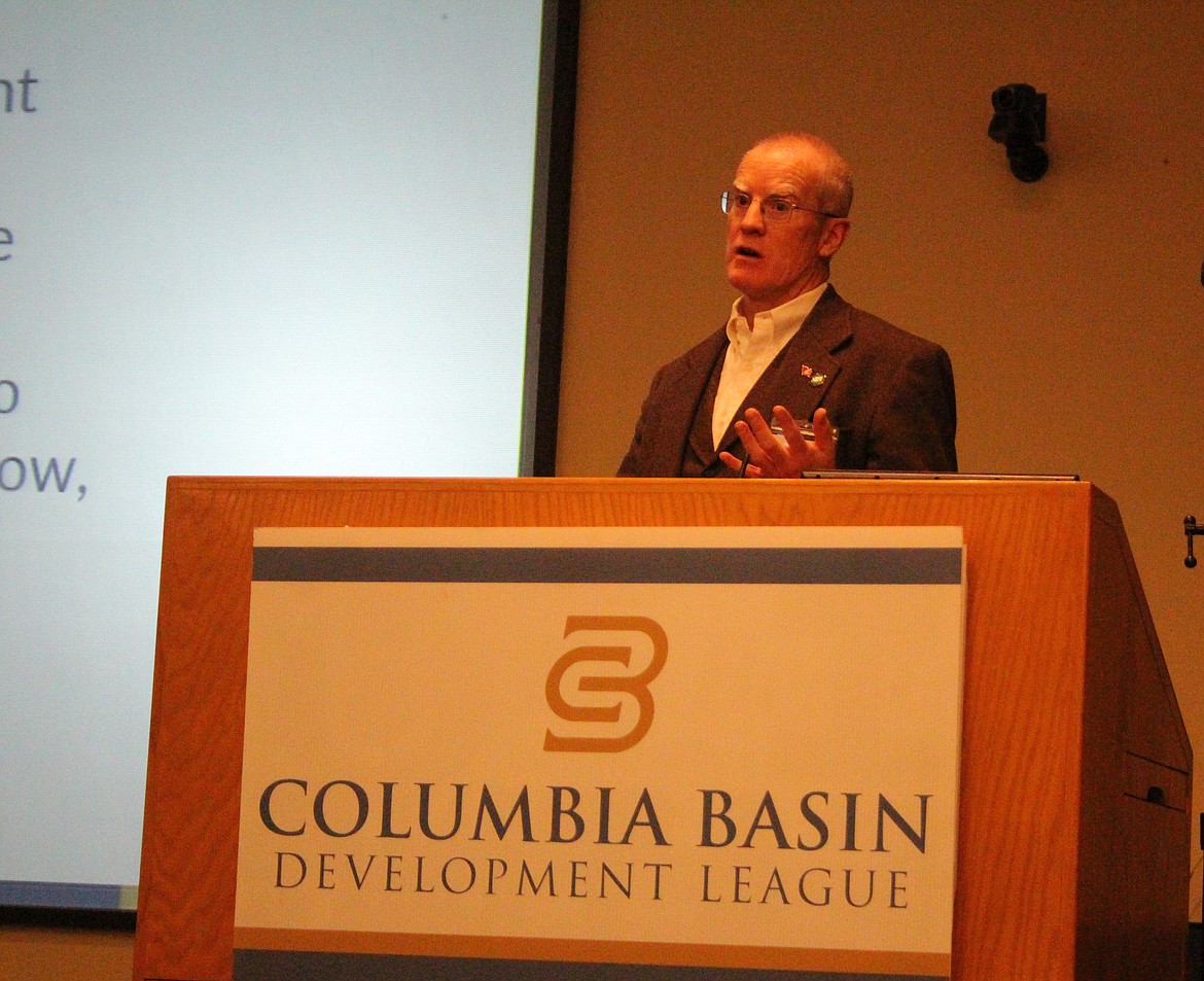 John O’Callaghan, secretary-manager of the South Columbia Basin Irrigation District, talks about upgrading Columbia Basin Project control systems during the annual meeting of the Columbia Basin Development League Tuesday.