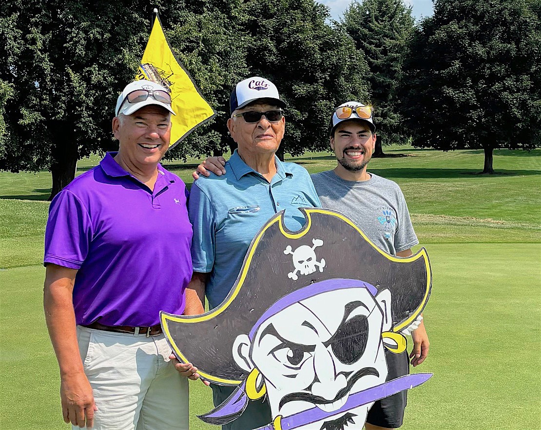 THREE GENERATIONS – Darryl Dupuis (center) with son Gary (left) and grandson Tyler (right) participated in the Polson Alumni/Faculty golf tourney held Aug 10 at Polson Bay Golf Course. (Sue Moore photo)