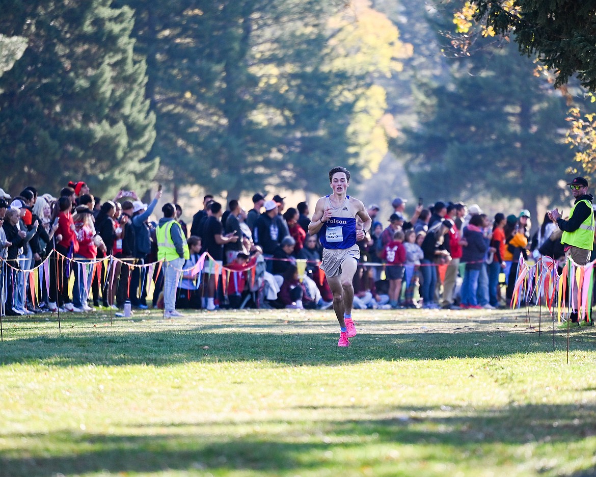 Polson's David DiGiallonardo heads for the finish line at the state Class A meet in Missoula, placing fourth with 16:28. (Christa Umphrey photo)