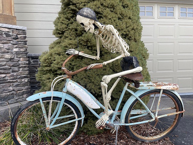 "Skelley" waits to greet trick-or-treaters at his home in Hauser Heights.