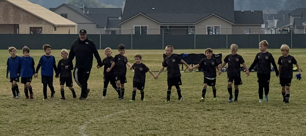 Photo by KATHY STERLING
The Sting U9 Boys Yellow soccer team beat the Spokane Shadow Junior B2016 Jarrett Valley team 8-1 last Saturday at Hayden Meadows Elementary, putting them in second place for the fall league season. Sting goals were scored by Jaxson Matheney (3), Isaak Sterling (1), Gideon Lee (1), Elijah Cline (2) and Hudson Helbling (1). From left are Micah D’Alessandro, Lincoln Sargent, Thomas Ely,  Hudson Helbling, coach Ian McKenna, Elijah Cline, Xavier Sousley, Athanasius Berry, Jaxson Matheney, Xander Rodriguez, Atlas Lepley, Isaak Sterling and Gideon Lee.