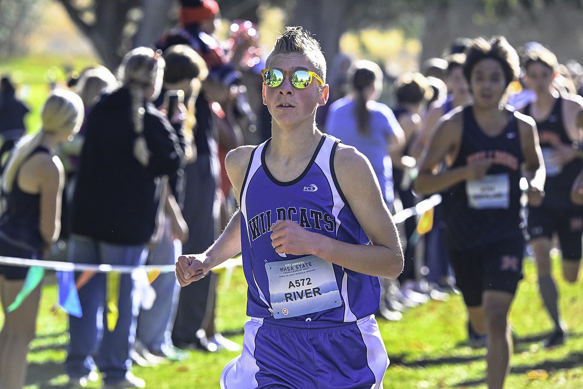 River Blazejewski runs to the finish at the state cross country meet in Missoula. Seth Anderson Photography.