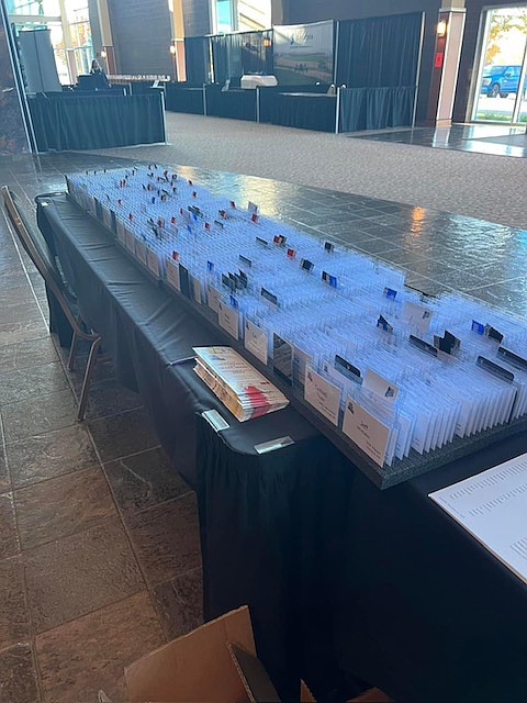 Information on various agriculture aspects is organized on a table at the Pacific Northwest Vegetable Association Annual Conference and Trade Show. President of the PNVA, James Zahand said that there is a lot of valuable information shared throughout the entire two-day conference.