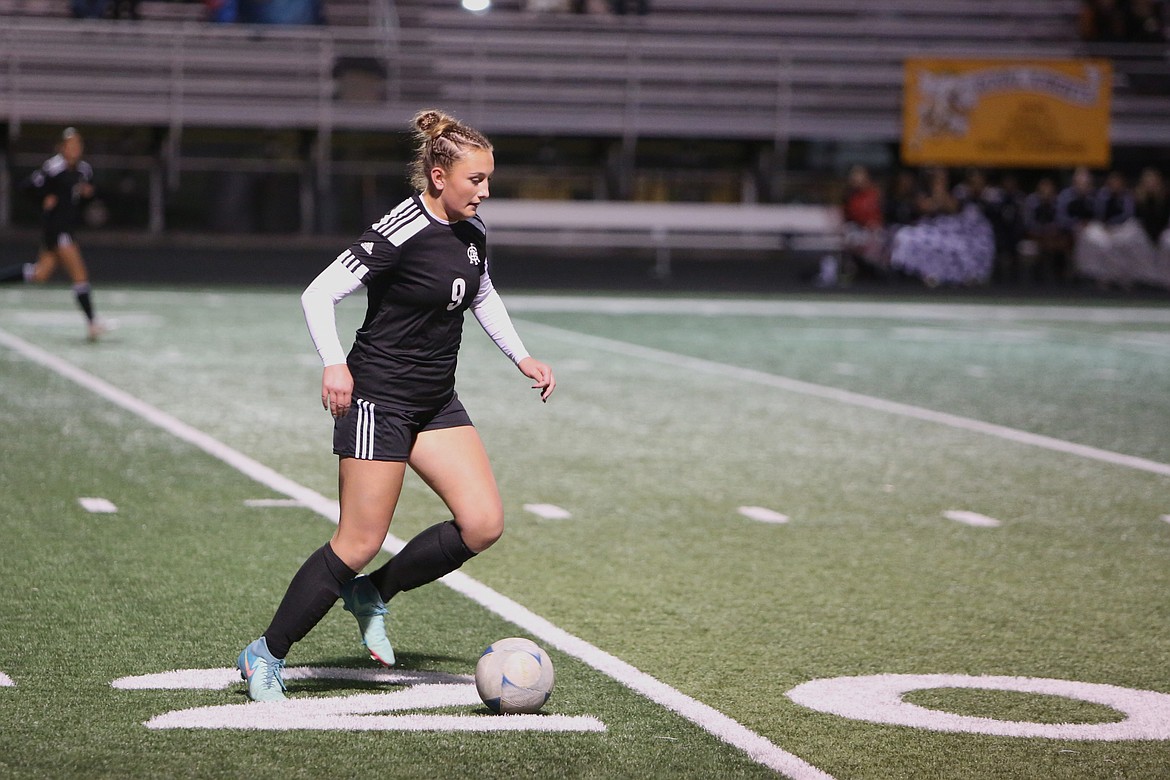 Royal junior Taylor Webb (9) runs up the field with the ball during the first half against Kiona-Benton on Tuesday.