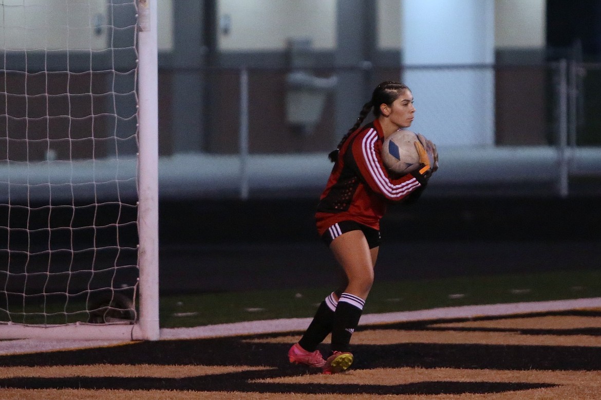 Royal freshman Grace Soliz saves a Kiona-Benton shot attempt during the first half. Soliz finished the match with nine saves.