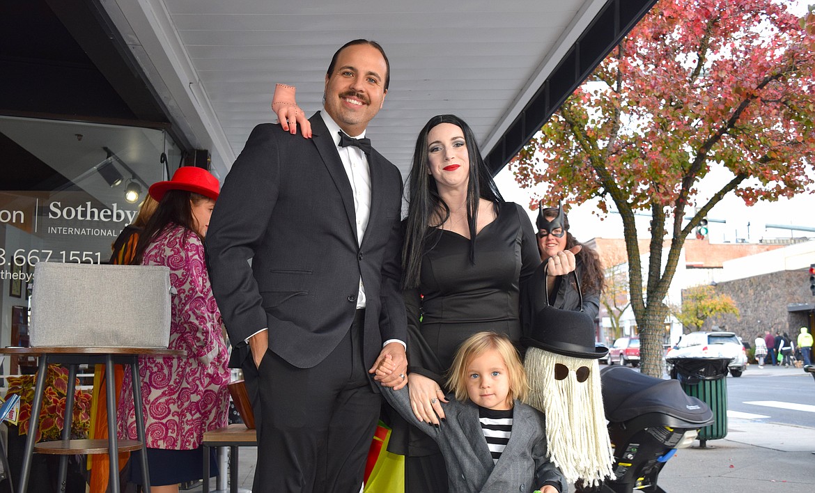 Octavian and Sydnee Rivas, and Merrik, 2, were a sight to behold as the Addams Family for trick-or-treating in downtown Coeur d'Alene.