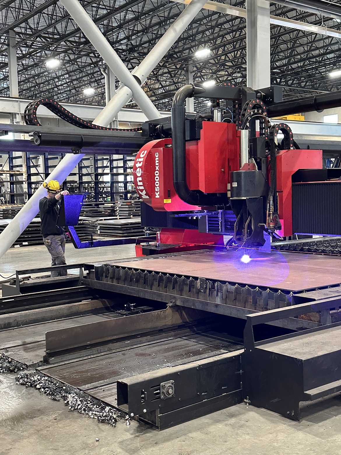 Luke Hansen running the kinetic plasma machine for Farwest Steel.