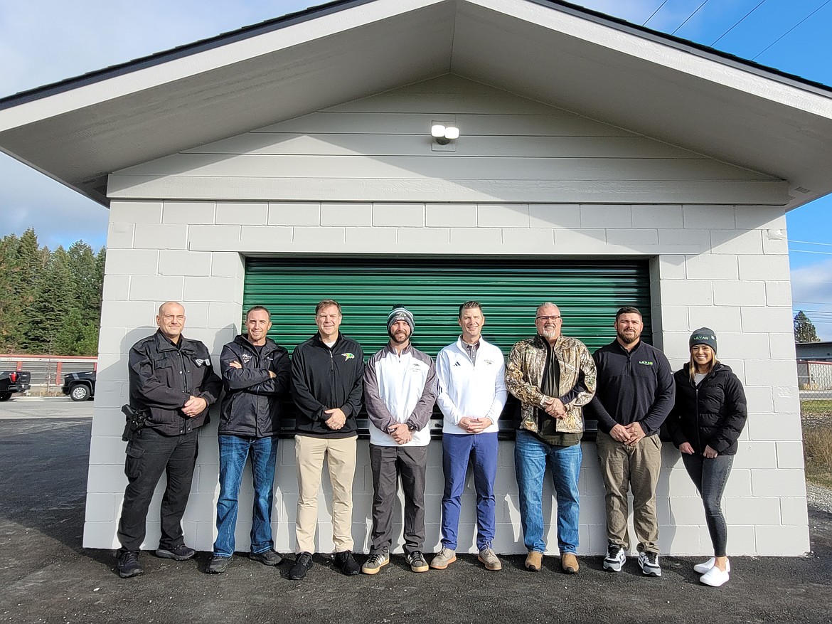 Celebrations are in order for the Lakeland Joint School District, where a community-supported project to construct a new concession and restroom facility on the soccer fields has been completed. Pictured on Oct. 28, from left: Armed guard John Hatcher; Derek Haller, True Grit Roofing; Nick Haynes, Lakeland boys soccer coach; Kevin Rogge, girls soccer coach; Lakeland Activities Director Matt Neff; and Steve Watts, Ryan Swanson and Chelsea Watts, Lexar Homes.