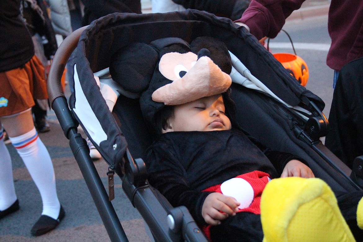 The whole trick-or-treat walk was a little too much for Mickey Mouse.