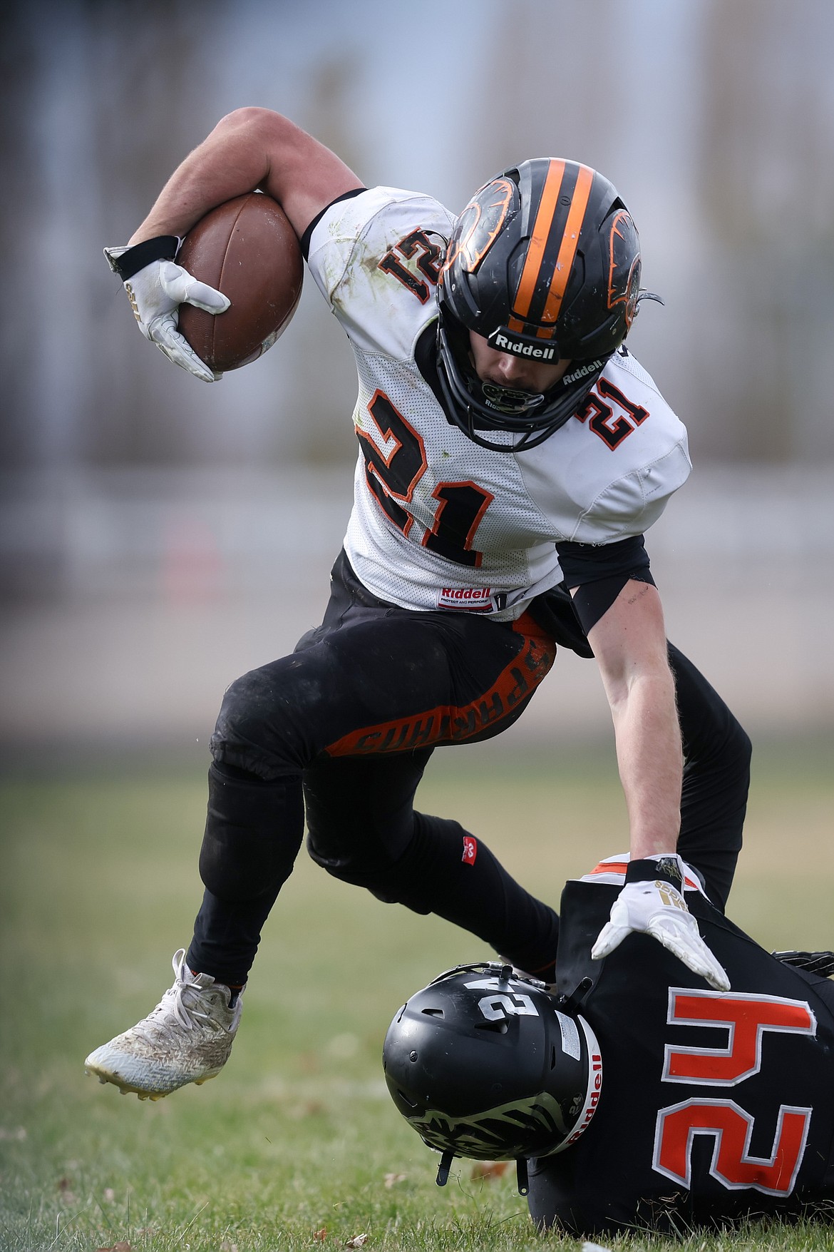 Priest River High sophomore running back Colton Kuprienko stiff arms Aberdeen's Mitchell Elliott during Saturday's matchup.