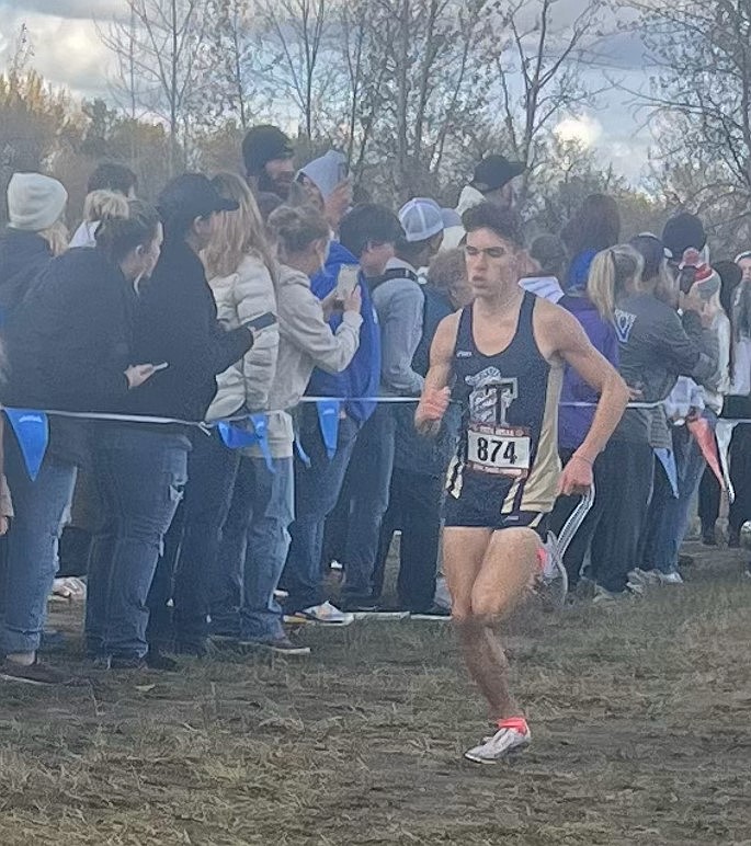 Courtesy photo
Timberlake junior Caleb Royce works his way to the finish line of the state 4A boys cross country race at Eagle Island State Park on Saturday. Royce finished eighth to earn medalist honors for finishing in the top 20.