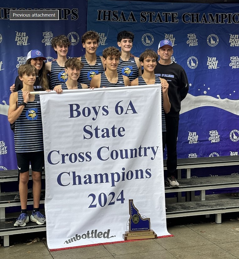 Courtesy photo
The Coeur d'Alene High boys cross country team capture a second straight state title, winning the 6A crown on Saturday at Eagle Island State Park. In the front row, from left are Wyatt Morgenstern, Rowan Henry, Max Cervi-Skinner and Mitchell Rietze. In the back are assistant coach Allison Howard, Gabe Heule, Zack Cervi-Skinner, Wyatt Carr and head coach Emry Carr.